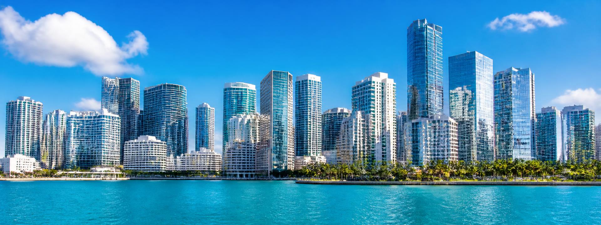 Miami Brickell financial district skyline on a clear day across Biscayne Bay
